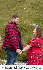 Plus Size Couple Out On A Travel Adventure On A Welsh Mountain