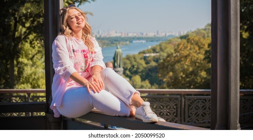 Plus size European or American nice woman at city, enjoy the life, walks. Life of people xl size, happy nice natural beauty woman. Concept of overweight