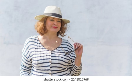 Plus size European mature woman with a good mood, enjoy the life, walks. Life of people xl size, happy nice natural beauty woman. Concept of body positive