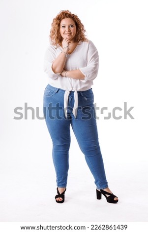 Plus size fashion model, fat woman in denim clothes and white shirt on white background, overweight female body