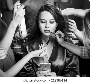 Plus Size Fashion Models Prepared For Runway By Stylish Designer. Black And White Photography