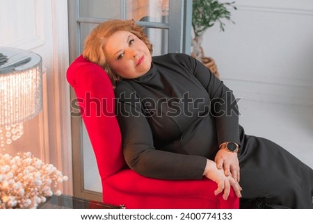 Plus size mature modern lady lifestyle. Middle age lady in classical dress. Concept of new life and changes