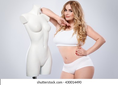 Plus Size Model And Dummy Female Torso In Studio