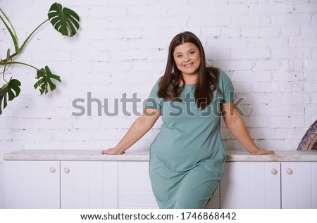 Plus size model at home