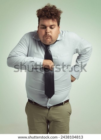 Plus size, sick and man with vomit, abdomen and unhealthy with double chin, stomach and fat in body. Ill, male person and guy retching in studio, professional and suit for work, adult and employee