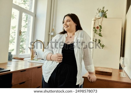 Similar – Image, Stock Photo Plus size woman with long curly hair in a dress stands among a flowering poppy meadow in early summer in a wreath of red poppies and holds a bunch of poppies