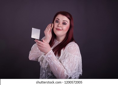 Plus Size Woman Powdering For Face Holding Compact Mirror 