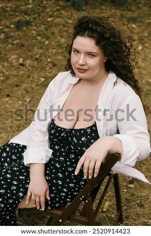 Similar – Happy curvy girl with curly hair