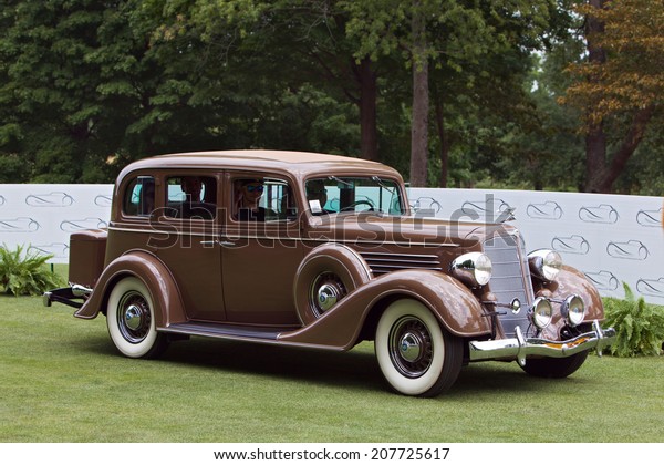 PLYMOUTH - JULY\
27: A vintage automobile on display July 27, 2014 at the Concours\
D\' Elegance Plymouth,\
Michigan.