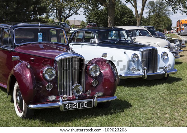 PLYMOUTH\
- JULY 29 : A couple of vintage Bentleys on display at the Concours\
D\'Elegance  July 29, 2012 in Plymouth,\
Michigan.