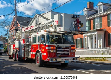 PLYMOUTH, MA, USA - NOV. 5, 2021: Plymouth Tower Fire Truck on North Street in historic town center of Plymouth, Massachusetts MA, USA. 