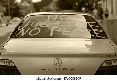 Plymouth, Michigan, USA - June 3, 2020: Car That Says No Justice No Peace.