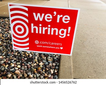 Plymouth, Minnesota - June 20, 2019: A We're Hiring Sign For Target Stores, Placed Outside The Entrance To The Big Box Department Store