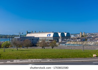 Plymouth, UK. 13/4/20:  A View Of Devonport Dockyard Naval Base On A Bright Sunny Day.