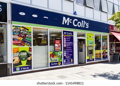 Plymouth, UK. 7/24/18:  The Front Of A McColl's Newsagent On A British High Street.