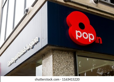 Plymouth, UK.  8/23/18:  The Royal British Legion Logo On A Shop Front On A Typical British High Street.