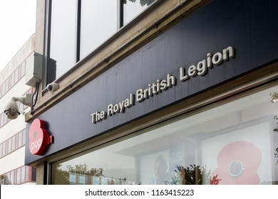 Plymouth, UK.  8/23/18:  The Royal British Legion Logo On A Shop Front On A Typical British High Street.