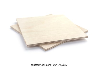 Plywood boards isolated on white background. Stack of plywood pieces on white
