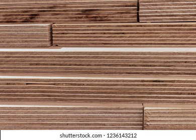 Plywood for industry and construction. Plywood parts. Plywood cuttings for use as texture or background. Plywood boards on the industry.