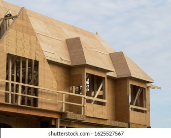 plywood roof and wall sheathing on a residential construction project - Shutterstock ID 1625527567