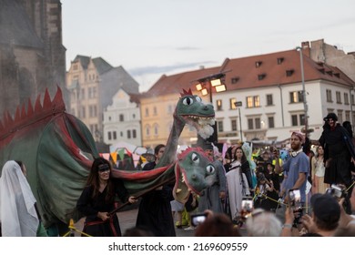 PLZEN, CZECH REPUBLIC - 11. 6. 2022: Historical weekend in Pilsen (Plzeň). Monster parade. Evening procession of the monsters and ghosts through the historical town. Two-headed dragon spewing smoke