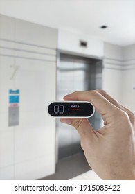 Pm2.5 Sensor. Measuring Air Quality In An Elevator Hallway. Bad Indoor Air Quality Lots Of Harmful Particulate Matter Air Pollution Content. Harmful Living Environment. 