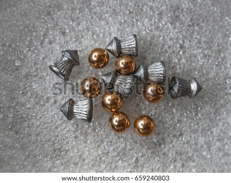 Pneumatic bullets and balls.
