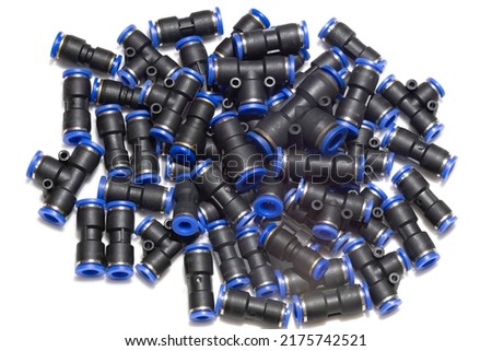 Pneumatic fittings are available in various sizes for air and water pipes. Used in the industry on a white background.