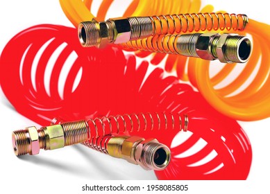 Pneumatic Hose Of A Truck For Supplying Compressed Air From A Tractor To A Trailer, Car Accessories, Car Parts, Yellow And Red, Detail  White Background Close-up Selective Focus