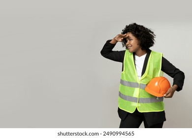 PNG,A young girl in the form of a construction worker with a hard hat, isolated on white background - Powered by Shutterstock