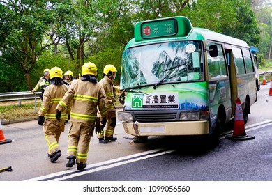 Po Lam, Hong Kong - 11 March 2017: Firefighters Check And Clean Up The Minibus Involved In A Traffic Accident.