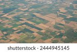 The Po Valley in Italy from the plane window during the landing of the airplane. Earth