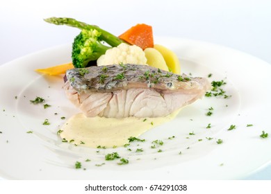 Poached Barramundi Fillet With Vegetable, Poached Fish On White Background 