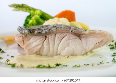 Poached Barramundi Fillet With Vegetable, Poached Fish On White Background 