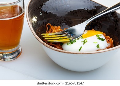 Poached Egg Over Noodles With Amber Ale