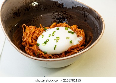 Poached Egg Over Noodles With Amber Ale