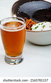 Poached Egg Over Noodles With Amber Ale