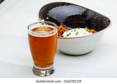 Poached Egg Over Noodles With Amber Ale