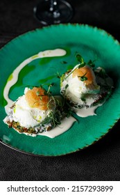 Poached Eggs With Pike Caviar On A Beautiful Plate