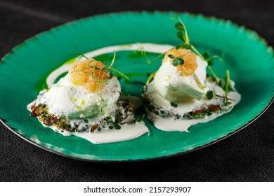 Poached Eggs With Pike Caviar On A Beautiful Plate