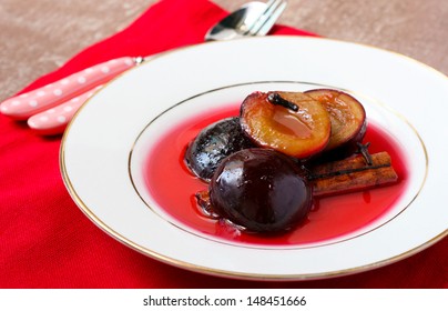 Poached plums with cinnamon and cloves