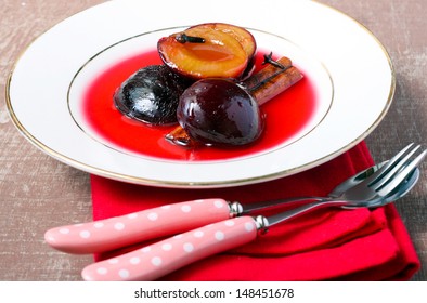 Poached plums with cinnamon and cloves