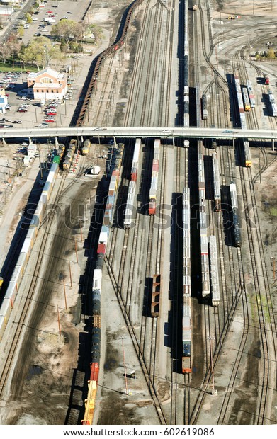 Pocatello, Idaho, USA April 17, 2017 Train\
cars and locomotives in a rail switching yard changing tracks for\
arrival at the  proper\
destination..