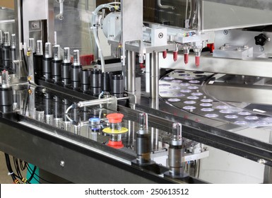 Pocatello, Idaho, USA June 18, 2012 A machine putting lipstick in tubes in a cosmetics factory.