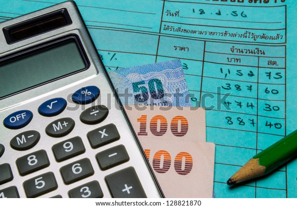 pocket calculator,\
money and sales slips