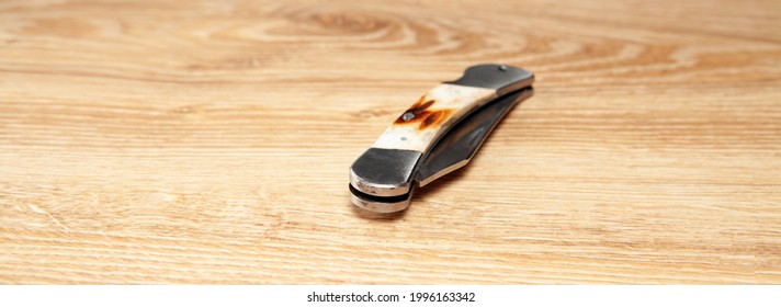 Pocket Knife On The Table