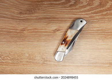 Pocket Knife On The Table