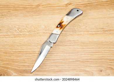 Pocket Knife On The Table