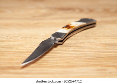 Pocket Knife On The Table