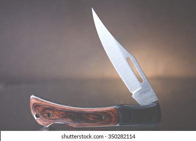 Pocket Knife On The Table